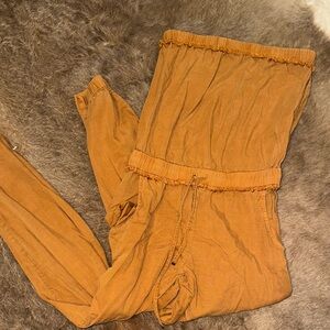 FP Movement by Free People Strapless Jumpsuit in Mustard Yellow